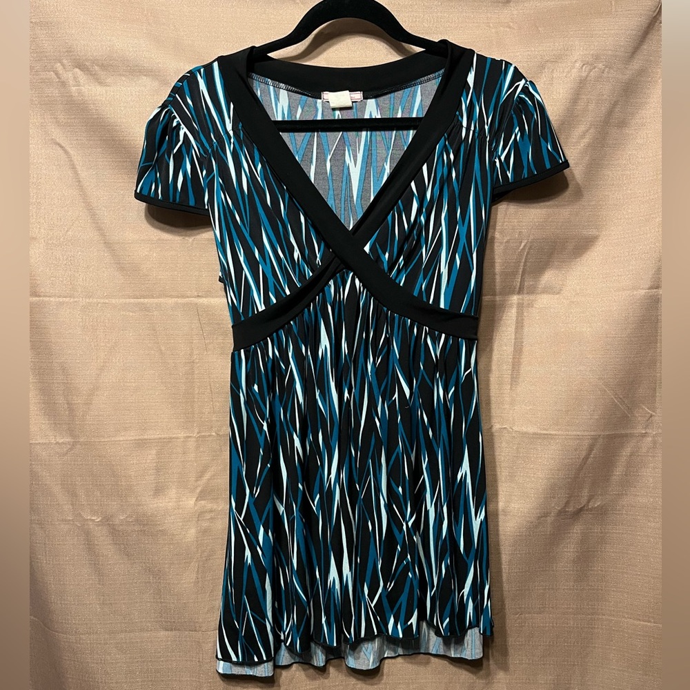Teal, black, and aqua tunic with a crisscross bodice and tied waist. PL